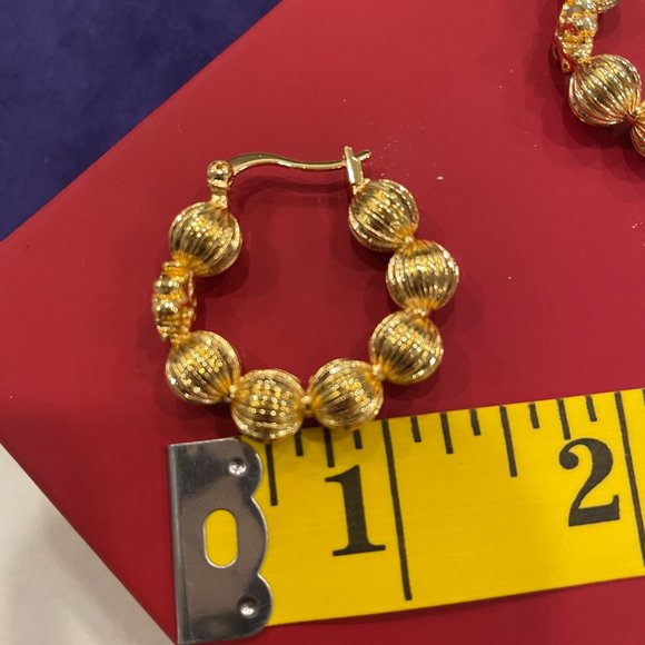 Brand new tory burch hoop earrings in gold - Picture 4 of 4